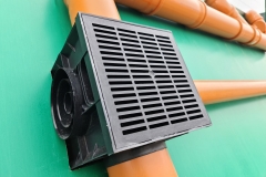 Underground French Drain System, outdoor sewer plastic pipes assembled together with a rain inlet